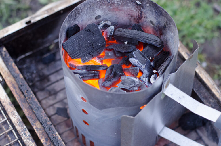 A chimney starter is used to get the charcoal ready for the grill in a more environmentally friendly way. 