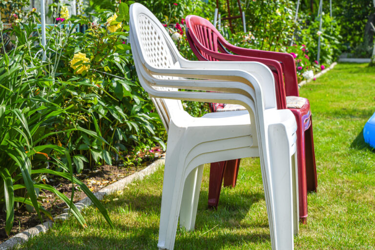 A picture of stacked garden chairs